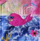 <h5>Ellie Chow - Mrs Nemo</h5><p>Ellie was inspired to enter this competition after viewing the Orange 12 x 12 competition, when visiting the Quilt Exhibition on desplay at Pukeora Estate, Waipukurau with her Nanny this year. Ellie created her piece from her imagination and Nannie's stash of material. Ellie is 11 years old.                                                                                                                                                                                                                                                                                                                  </p>